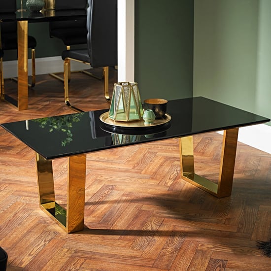 Photo of Antebi high gloss coffee table with gold legs in black