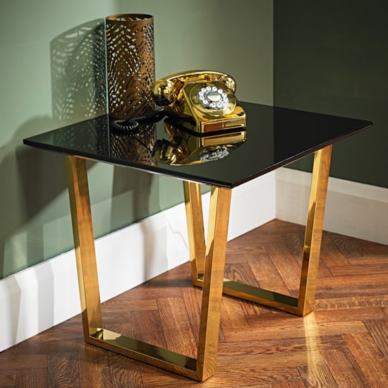 Read more about Antebi high gloss lamp table with gold legs in black