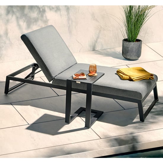 Photo of Arica sunbrella fabric sun lounger and drinks table in grey