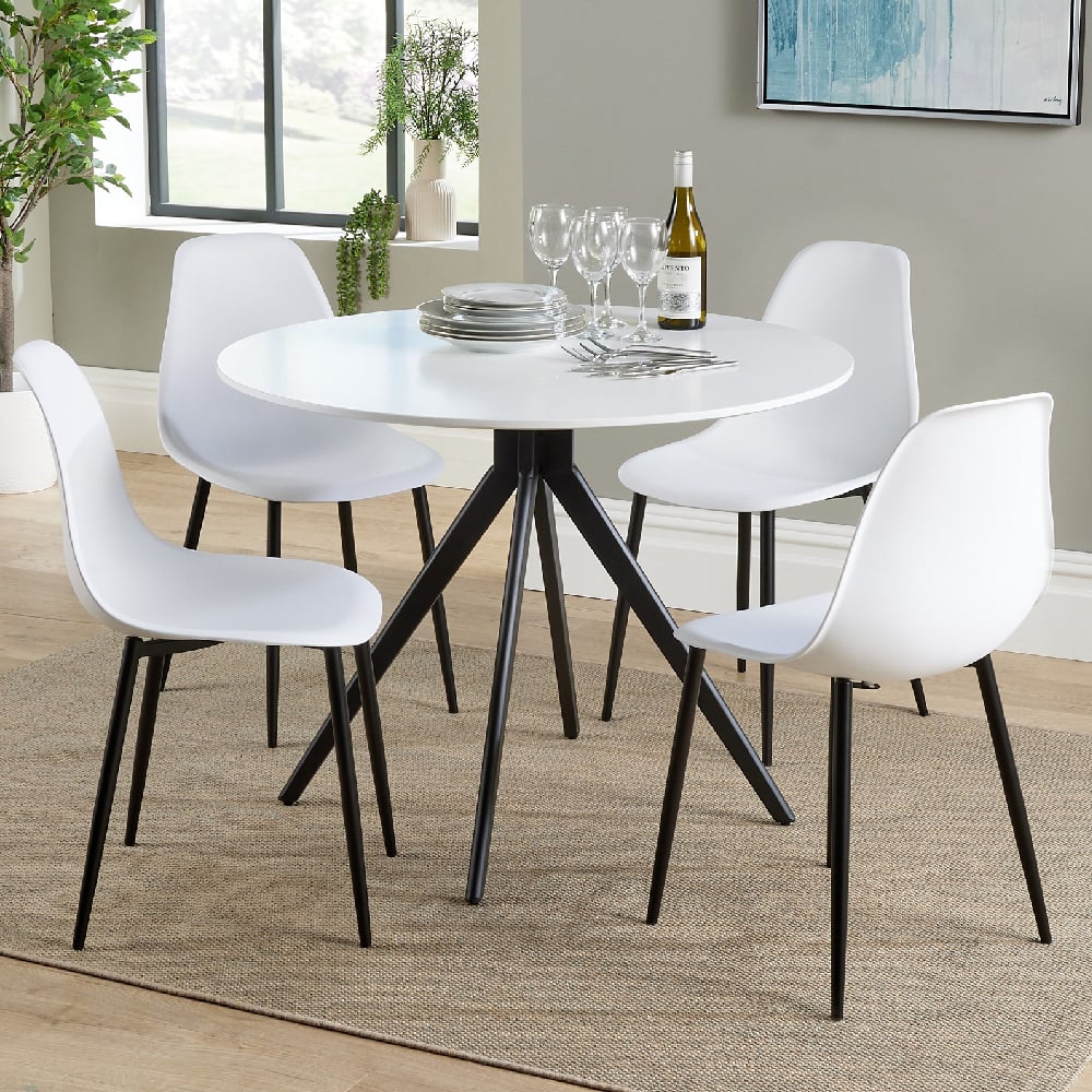 Read more about Arta round white wooden dining table 4 duo plastic white chairs