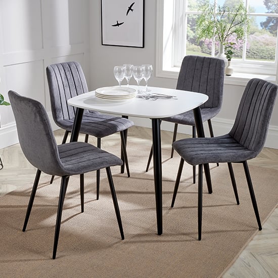 Read more about Arta square white wooden dining table 4 dark grey straight chairs