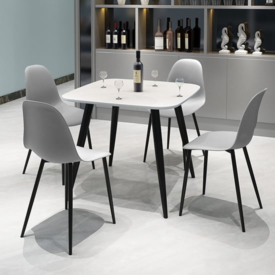 Read more about Arta square white wooden dining table 4 duo plastic grey chairs