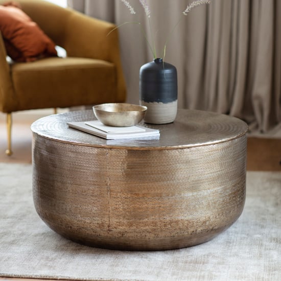 Photo of Artesia round metal coffee table in antique brass