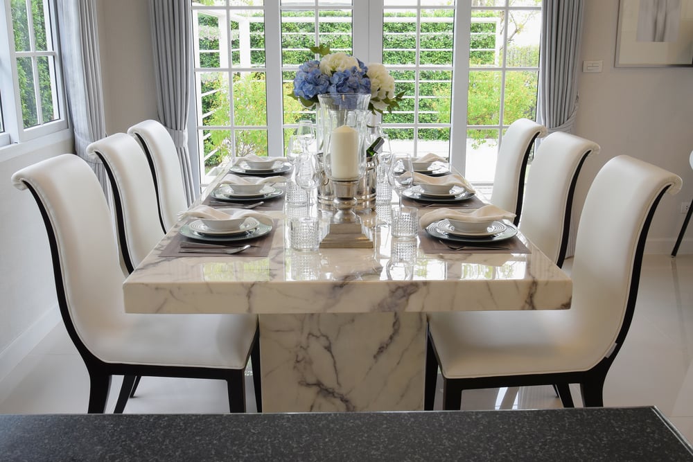 Savour Viands on designer dining table and chairs