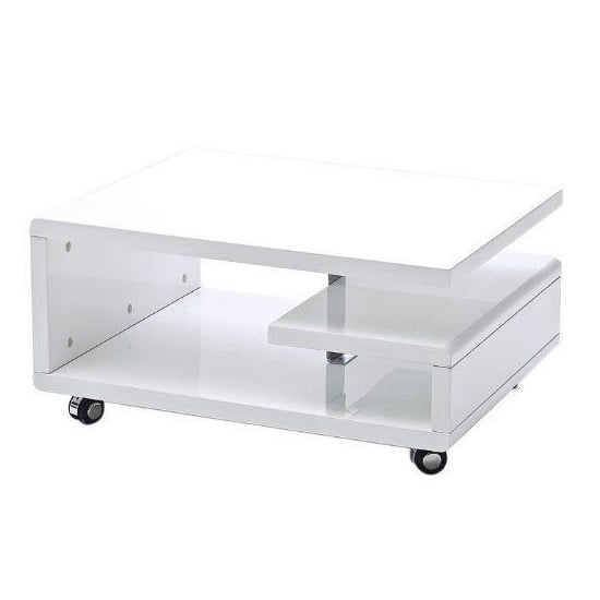 Read more about Asellus coffee table in white high gloss with castors