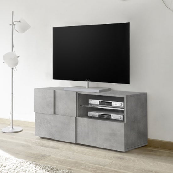 Read more about Aleta wooden small tv stand in concrete with 1 door 1 drawer