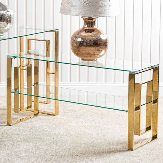 Photo of Athens clear glass tv stand with gold metal base