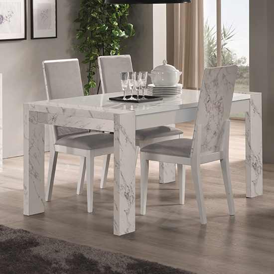 Photo of Attoria gloss white marble effect dining table with 4 chairs