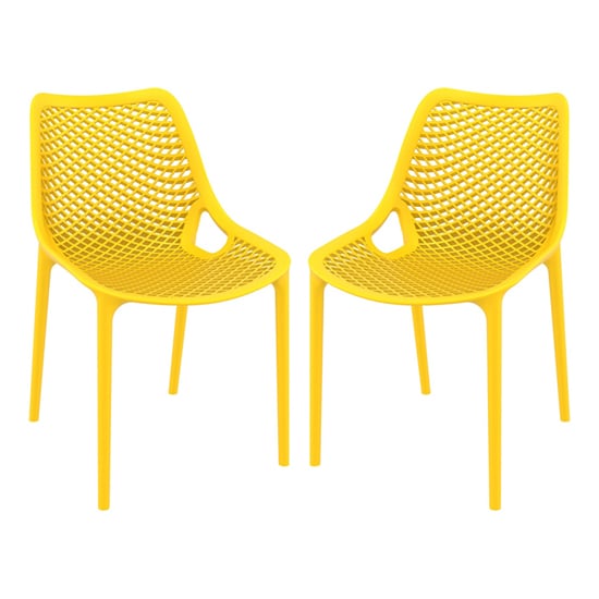 Photo of Aultas outdoor yellow stacking dining chairs in pair