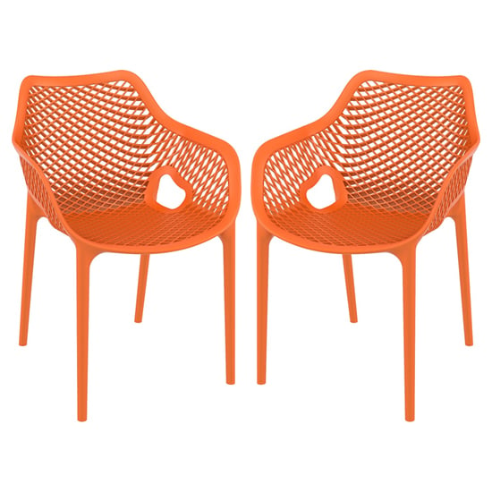 Photo of Aultos outdoor orange stacking armchairs in pair