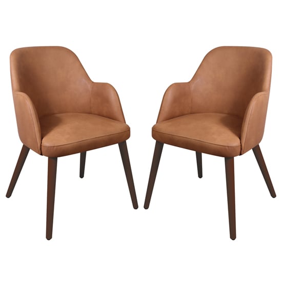 Photo of Avelay vintage cognac faux leather armchairs in pair