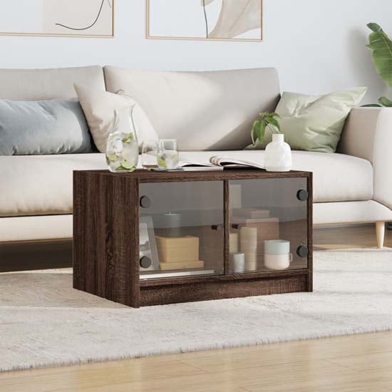 Product photograph of Avila Wooden Coffee Table With 2 Glass Doors In Brown Oak from Furniture in Fashion