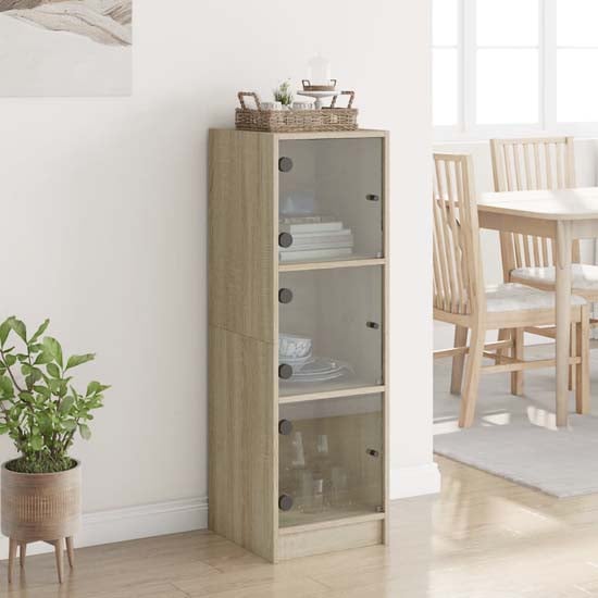 Product photograph of Avila Wooden Highboard With 3 Glass Doors In Sonoma Oak from Furniture in Fashion