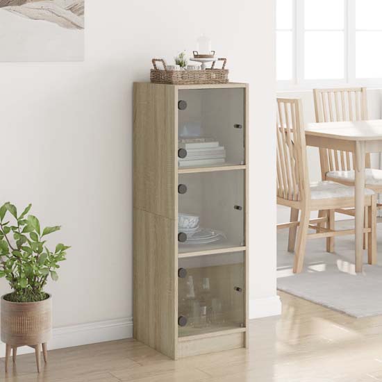 Product photograph of Avila Wooden Highboard With 3 Glass Doors In Sonoma Oak from Furniture in Fashion