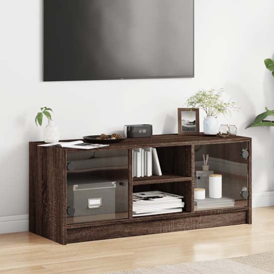 Read more about Avila wooden tv stand with 2 glass doors in brown oak