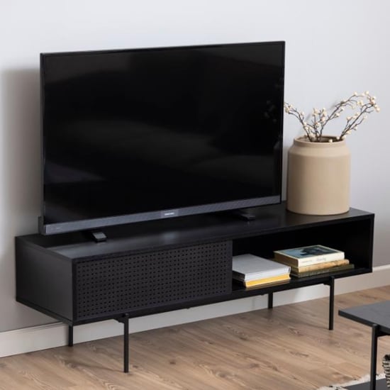 Photo of Avila wooden tv stand with sliding door in ash black