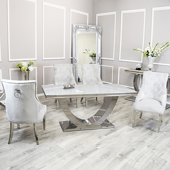Photo of Avon white glass dining table with 6 dessel light grey chairs