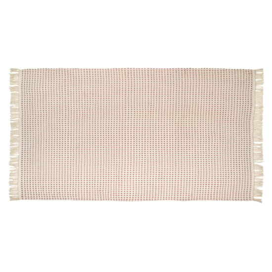 Photo of Azteca coconut large rectangular grove fabric rug in coral