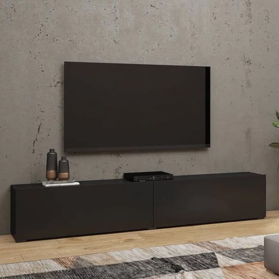 Read more about Azusa wooden tv stand with pull-down doors in matt black