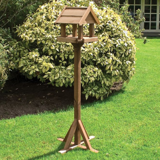 Photo of Baslow wooden bird table in natural timber
