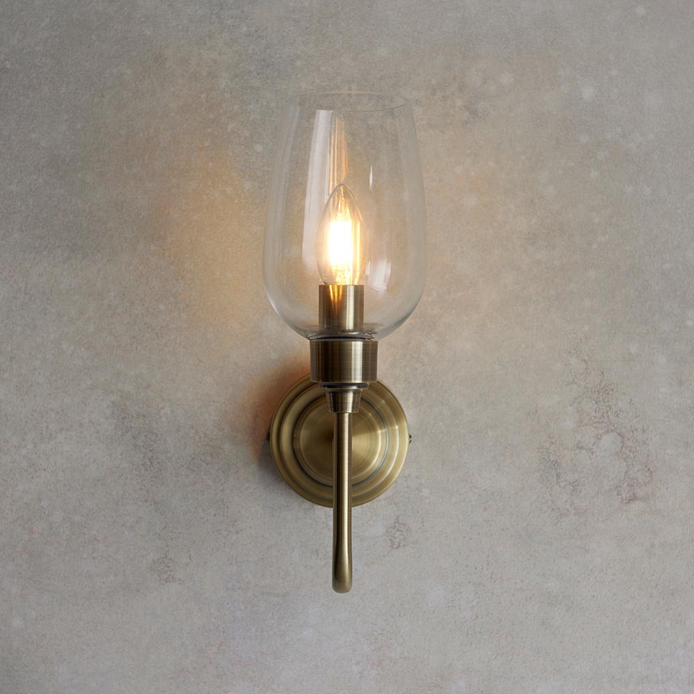 Bastrop Clear Glass Wall Light In Antique Brass