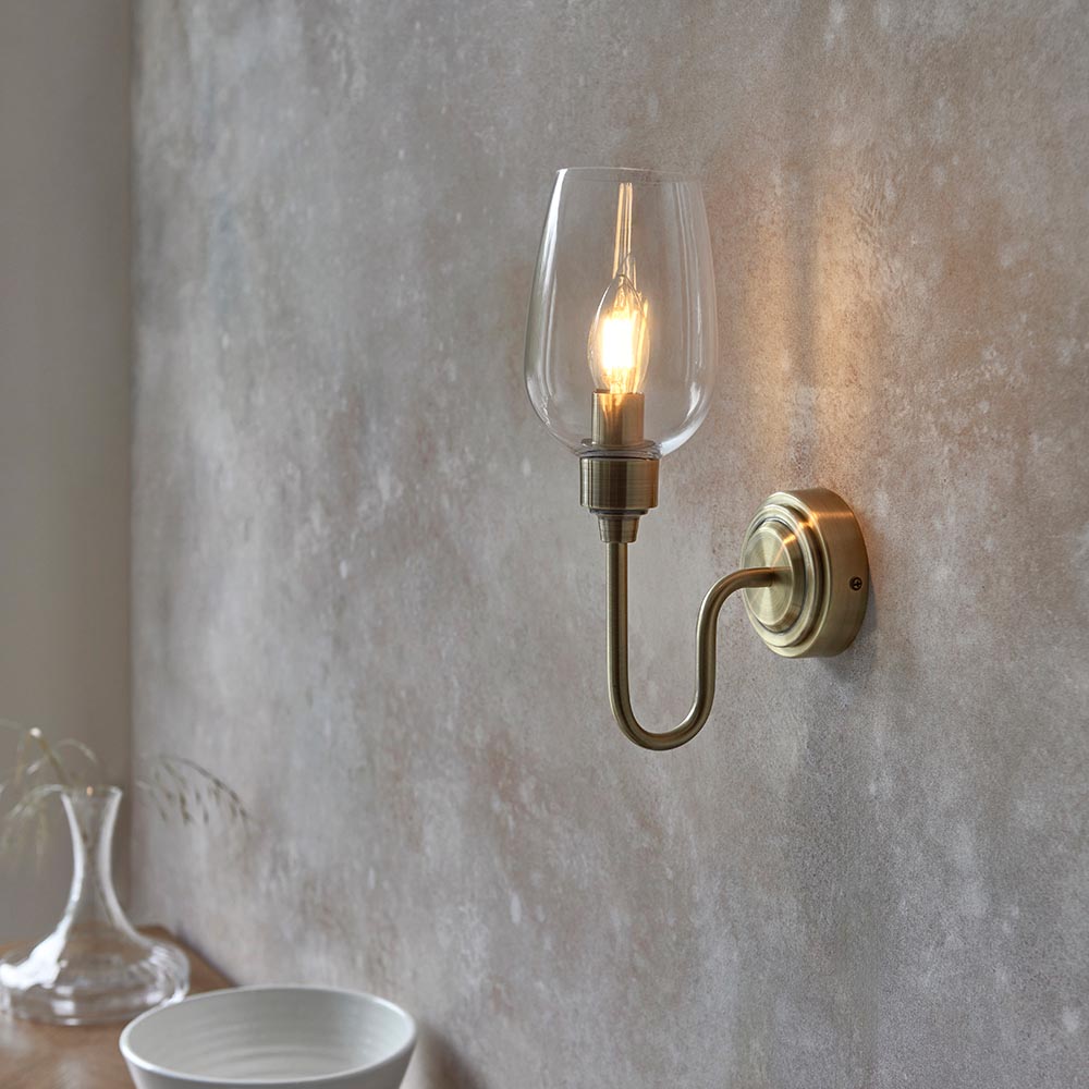 Bastrop Clear Glass Wall Light In Antique Brass