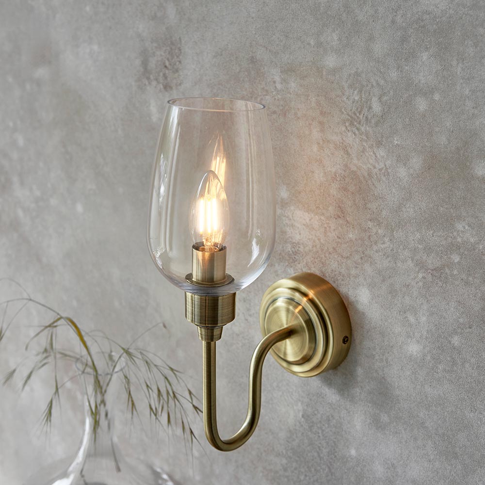 Bastrop Clear Glass Wall Light In Antique Brass