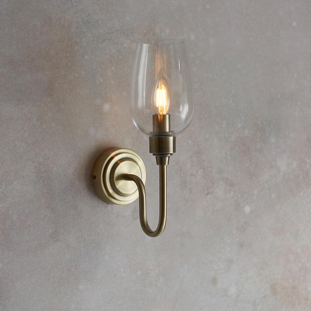 Bastrop Clear Glass Wall Light In Antique Brass