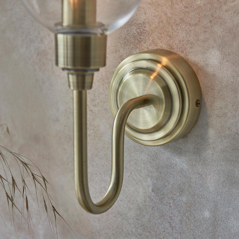 Bastrop Clear Glass Wall Light In Antique Brass