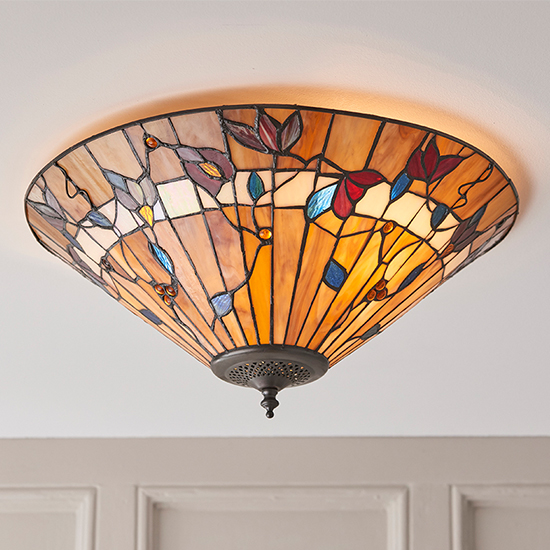 Product photograph of Bauchi Medium Tiffany Glass Flush Ceiling Light In Dark Bronze from Furniture in Fashion