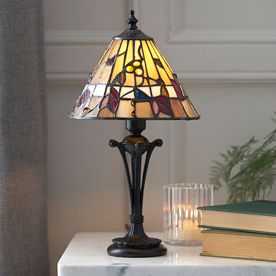 Photo of Bauchi small tiffany glass table lamp in dark bronze