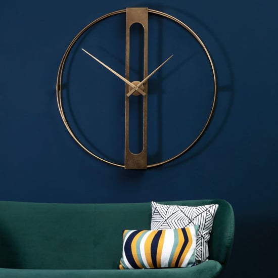 Read more about Bealie round metal wall clock in gold