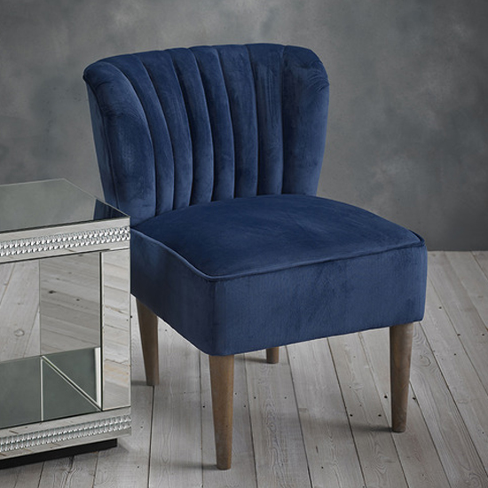 Read more about Belle velvet lounge chair with wooden legs in midnight blue