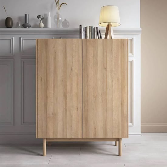 Photo of Belton wooden highboard with 2 doors in riviera oak