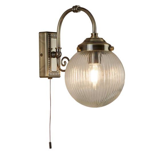 Product photograph of Belvue Clear Globe Shade Wall Light In Antique Brass from Furniture in Fashion