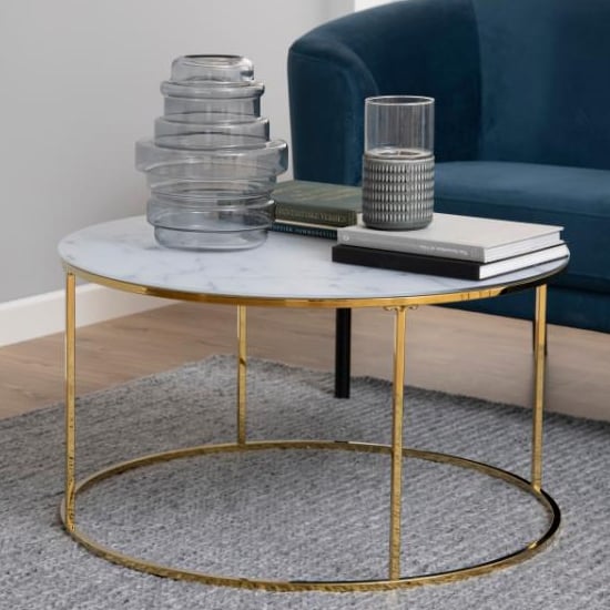Photo of Bemid white marble effect glass coffee table with gold frame