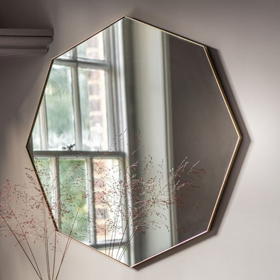 Product photograph of Benton Octagon Wall Mirror With Champagne Metal Frame from Furniture in Fashion