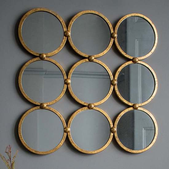 Read more about Beverly wall mirror with antique gold leaf metal frame