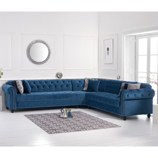 Bicasto Chesterfield Velvet Corner Sofa In Blue