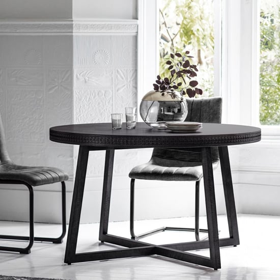 View Boho boutique round dining table in matt black charcoal