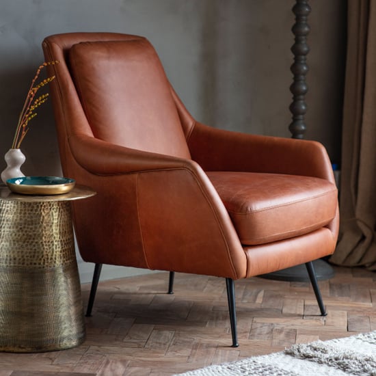 Photo of Bossier leather armchair in brown with matt black metal legs