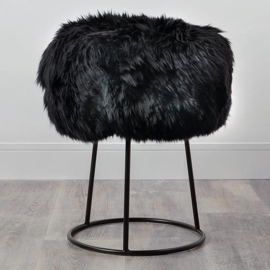 Photo of Bovril sheepskin stool with black metal legs in black