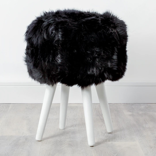 Bovril Sheepskin Stool In Black With White Wooden Legs