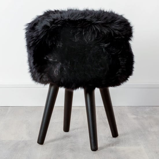 Read more about Bovril sheepskin stool with wooden legs in black