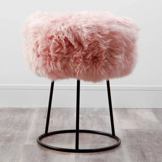 Product photograph of Bovril Sheepskin Stool In Blush Pink With Black Metal Legs from Furniture in Fashion