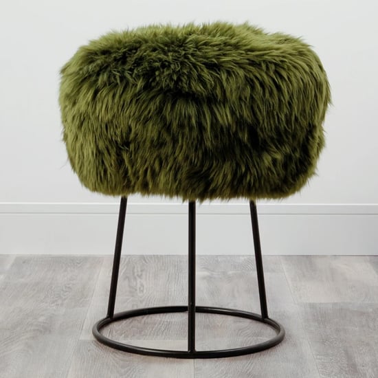 Read more about Bovril sheepskin stool with black metal legs in olive green