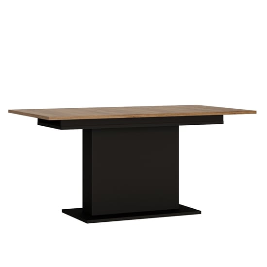 Photo of Brecon wooden extending dining table in walnut and black