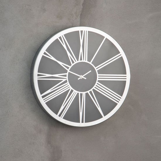 Photo of Breiley round design wall clock in black and chrome frame