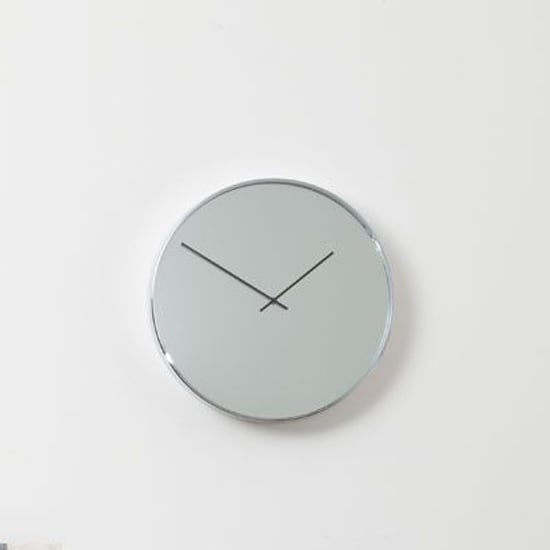 Photo of Breiley round minimal mirrored wall clock in chrome frame