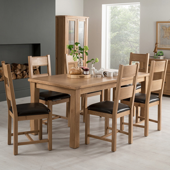 Photo of Brex large wooden extending dining table with 6 chairs